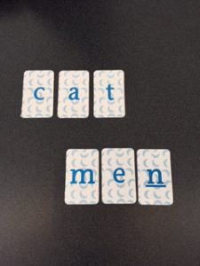 Putting letters together to make words