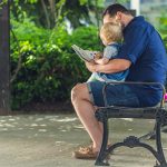 Dad Reading to Child